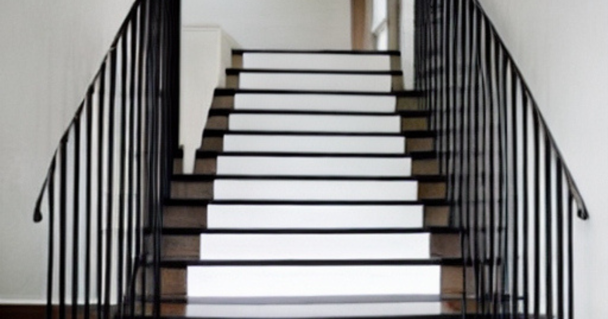 Stairs with a white carpet runner