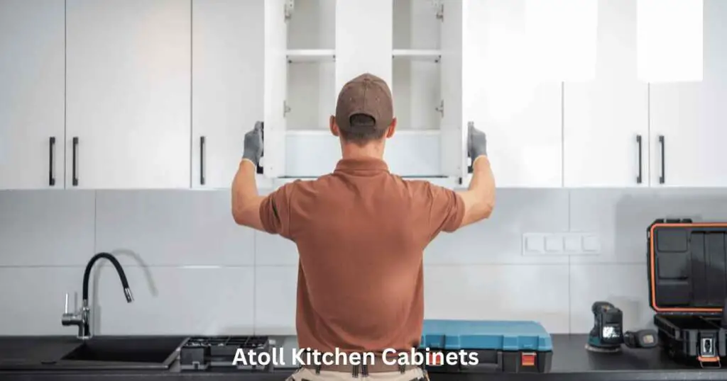 A Man Opening Atoll Kitchen Cabinets