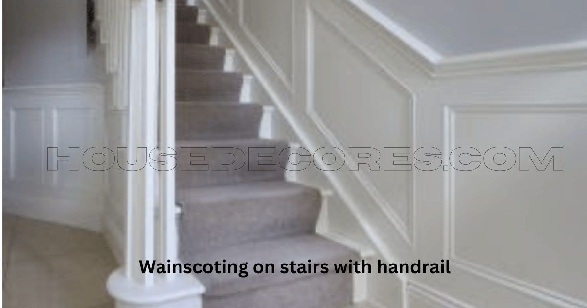 Wainscoting on stairs with handrail with gray runner