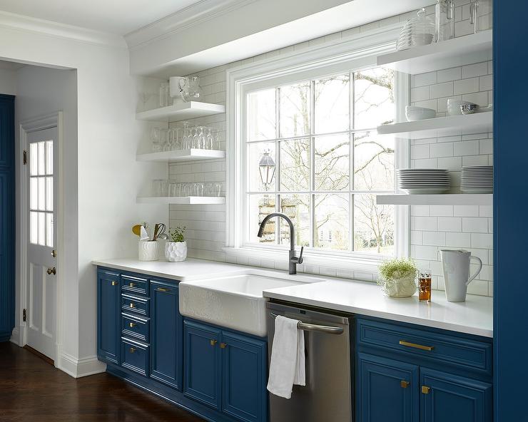 Blue Cabinets with White Trim and Molding
