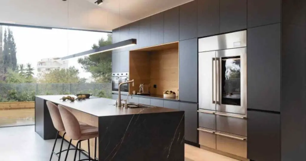 One wall kitchen with island with the essential elements 