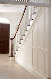 Board and batten wainscoting with wainscoting stairs