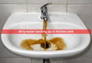 Why is water backing up in kitchen sink?